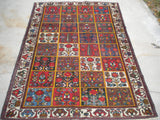 Antique Persian Bakhtiari from the 1920's.       4'6"x 6'7"