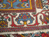 Antique Persian Bakhtiari from the 1920's.       4'6"x 6'7"